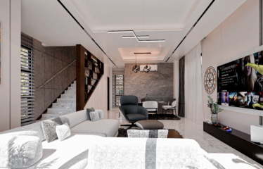 A 2 bedroom townhouse for sale in Adenta Accra showing the inside of the house with the view of a modern living room.