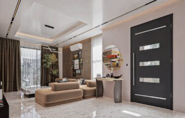 An extended view of an open plan modern living room in a 3 bedroom house for sale at Regimanuel Satellite City Adenta in Accra